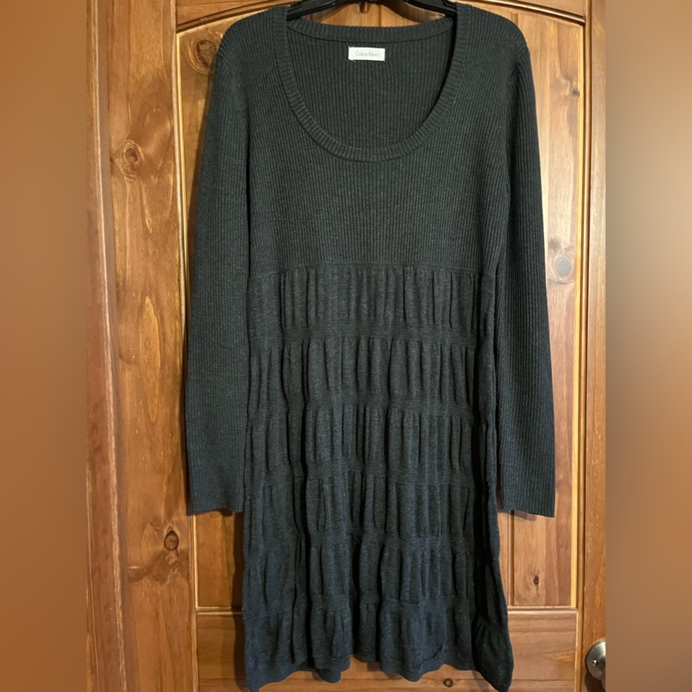 Calvin Klein dark grey sweater dress. No “size” tag but it is XL.